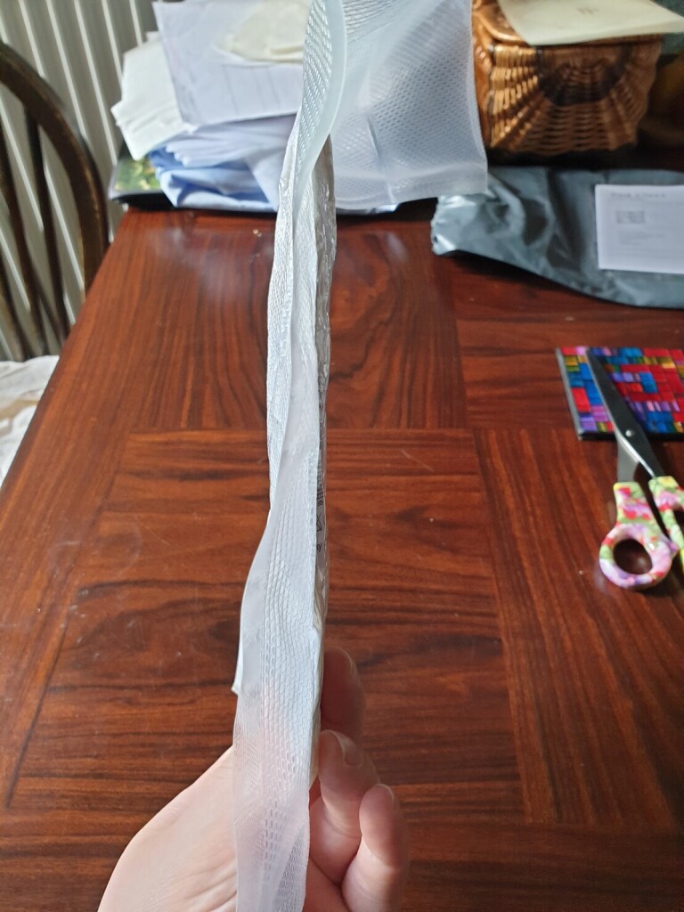 side view of a very thin plastic package