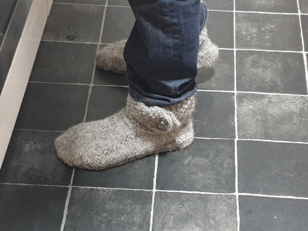 another grey pair of slipper socks, which look similar to the first but are actually quite different lmao