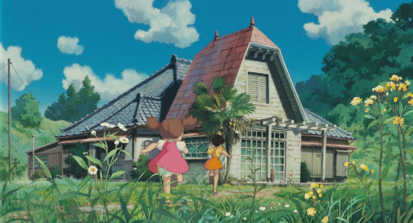 Still from My Neighbour Totoro, of the two sisters running towards the house